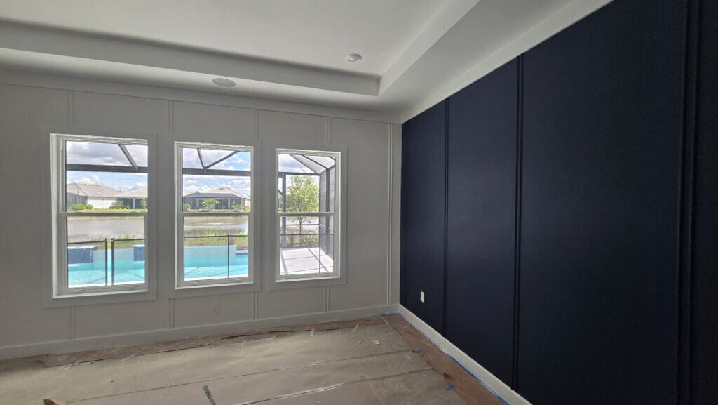 Bright Bedroom Navy Cabinets