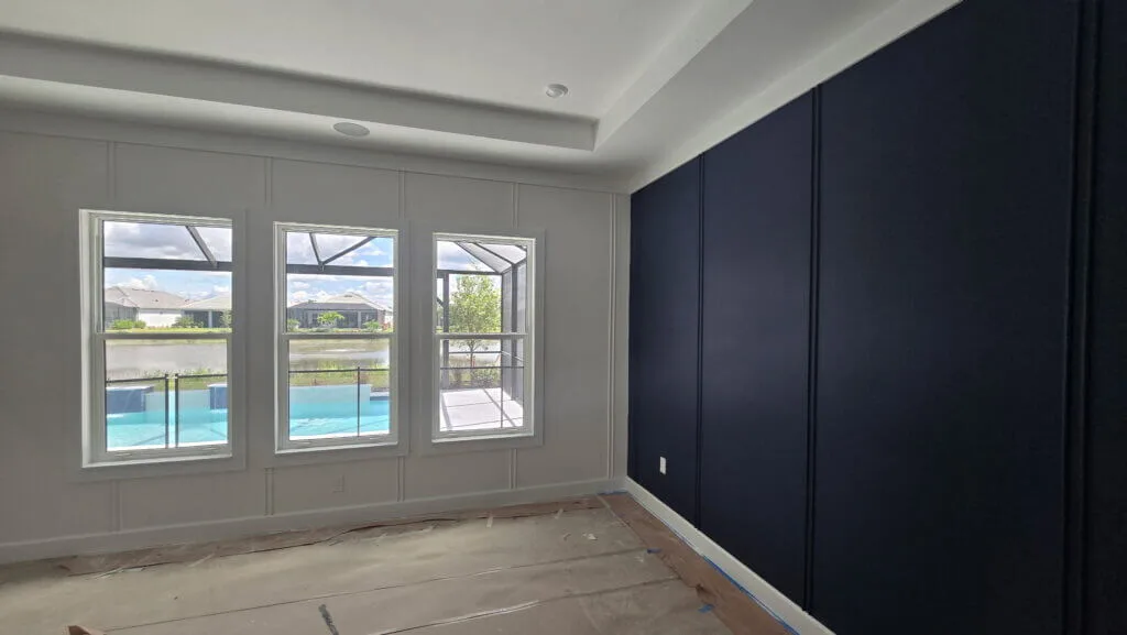 Bright Bedroom Navy Cabinets